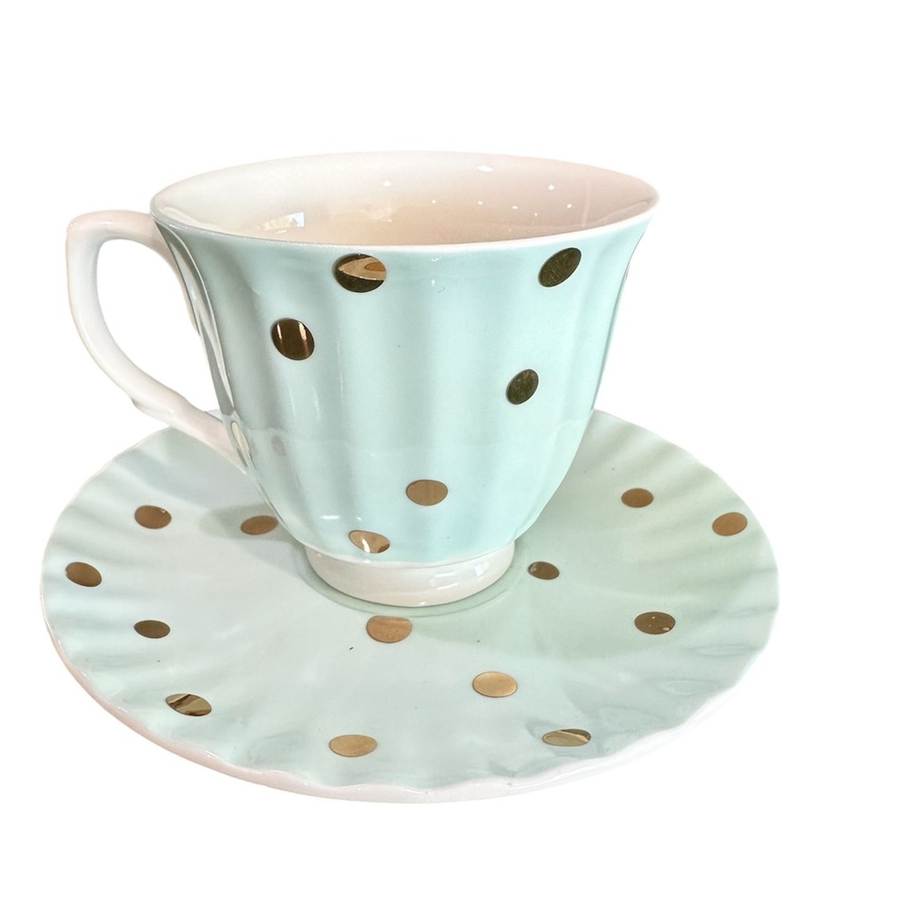 Gold polkadot teacup and saucer. Goldie by Robert Gordon.
